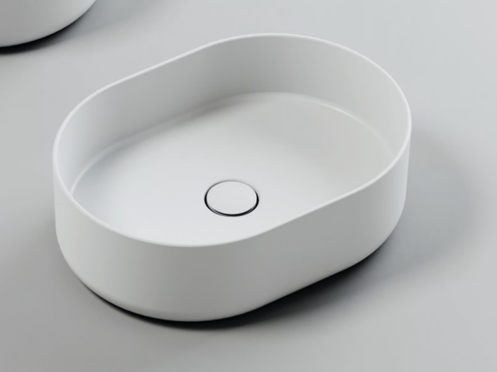 AUREA - Oval countertop washbasin _ Azzurra Ceramica